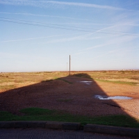 The shadow cast by a lighthouse